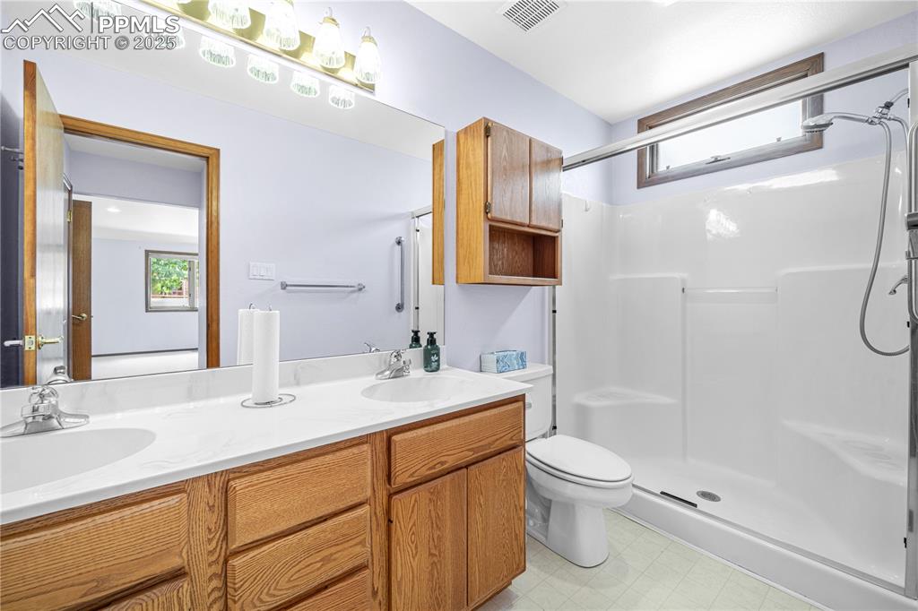 Image 10 of 30: Master Bathroom