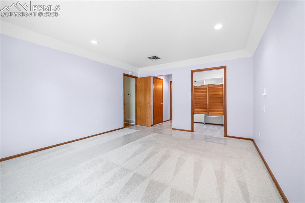 Image 9 of 30: Master Bedroom