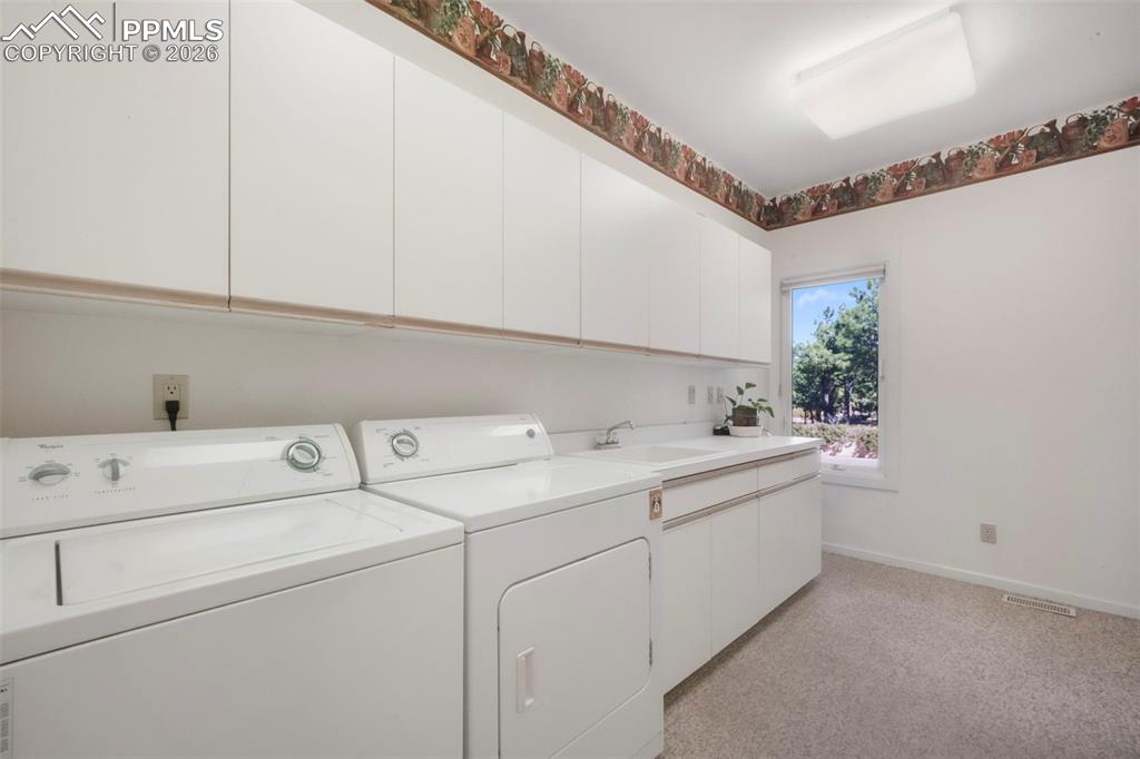 Image 36 of 50: Access to oversized garage