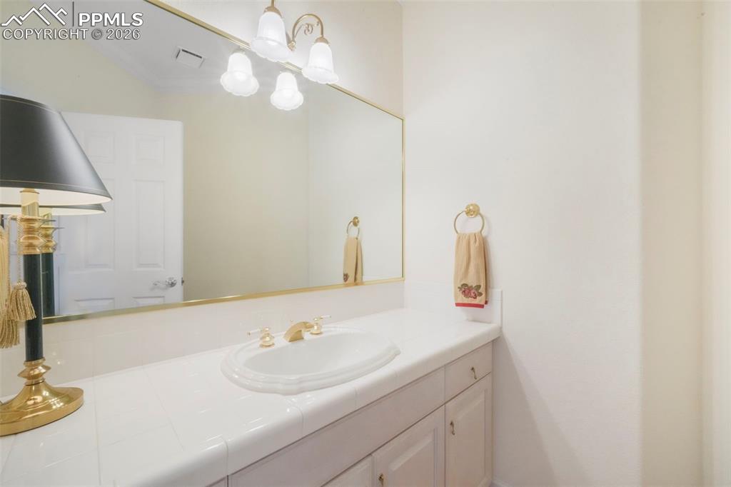 Image 48 of 50: Basement hall bathroom