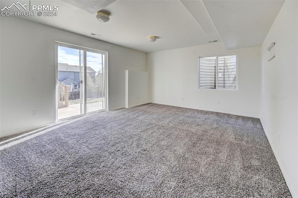 Image 37 of 50: Walkout basement, large family room