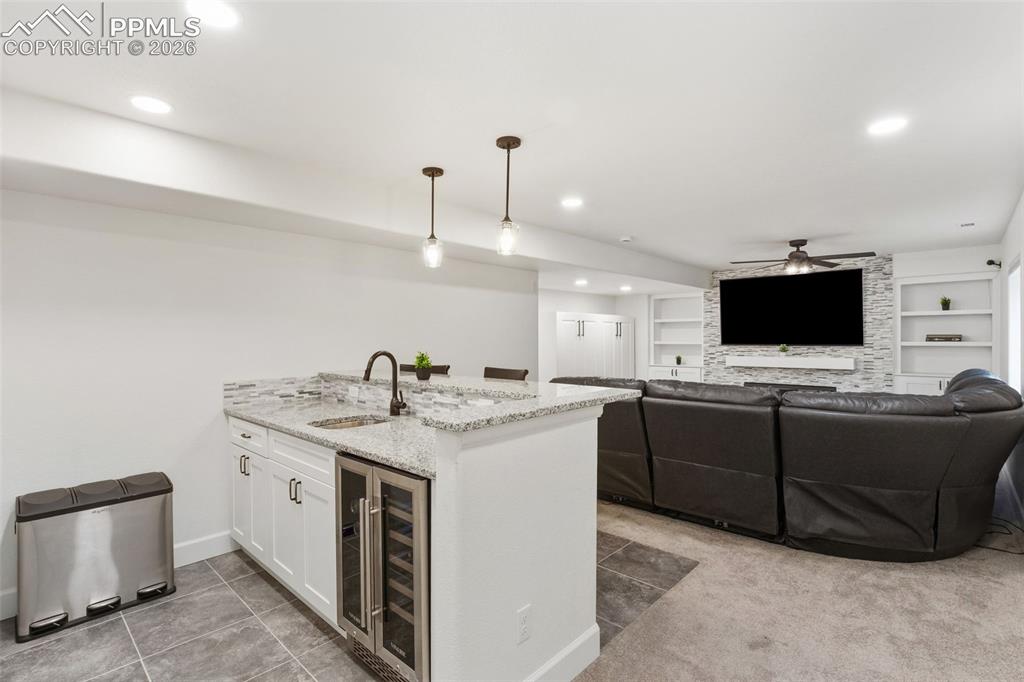Image 2 of 32: Basement Fireplace and Cabinet Install