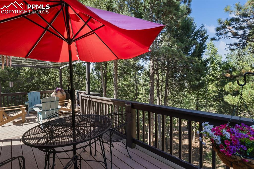 Image 28 of 43: Deck with outdoor dining space