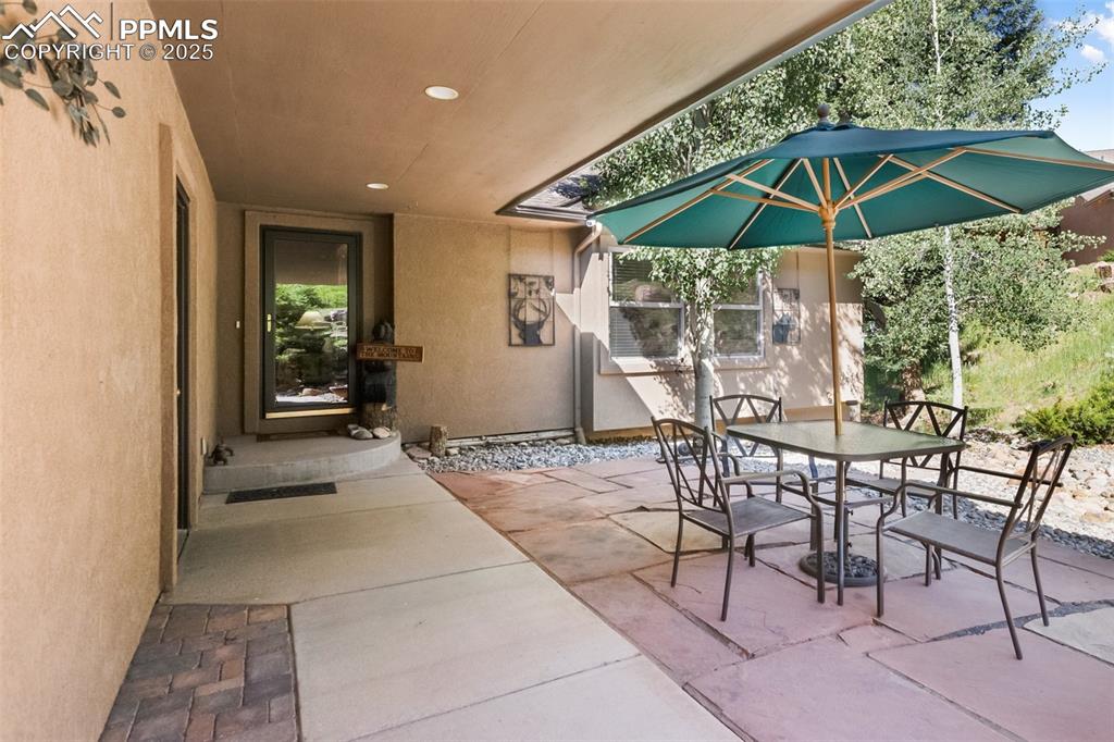 Image 7 of 43: View of patio / terrace with outdoor dining space