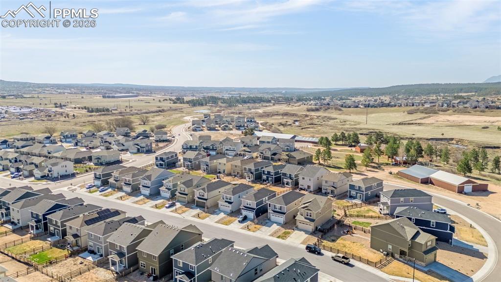 Image 24 of 27: Aerial view with a residential view