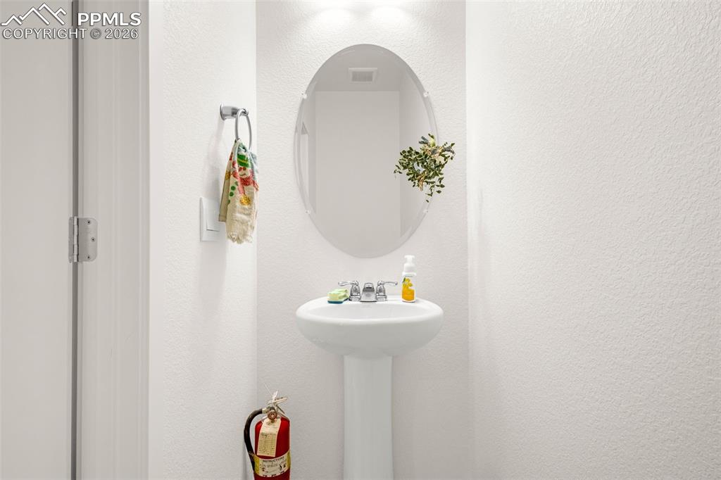 Image 9 of 27: Bathroom featuring visible vents