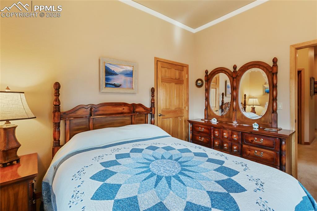 Image 35 of 47: Bedroom featuring crown molding.