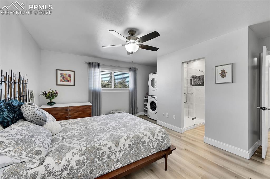 Image 13 of 42: Bedroom featuring light hardwood / wood-style flooring, ensuite bathroom, s