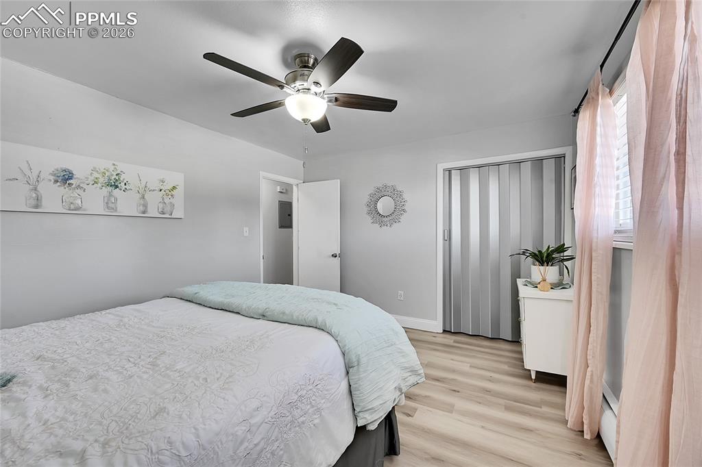 Image 19 of 42: Bedroom featuring light hardwood / wood-style floors and ceiling fan