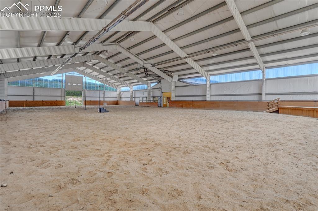 Image 31 of 50: View of yard with a covered structure