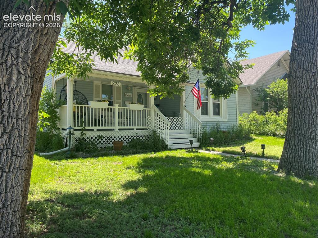 Image 11 of 25: Established mature trees provide ample shade, creating a cool and inviting 