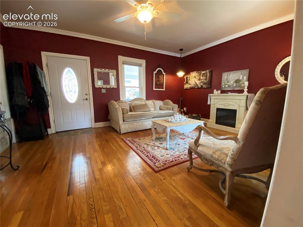Image 13 of 25: Enjoy the beauty of restored original hardwood floors, a standout feature t
