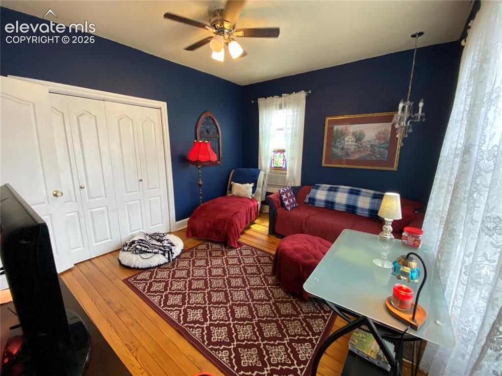 Image 15 of 25: The front facing bedroom offers flexibility as a home office, reading nook,