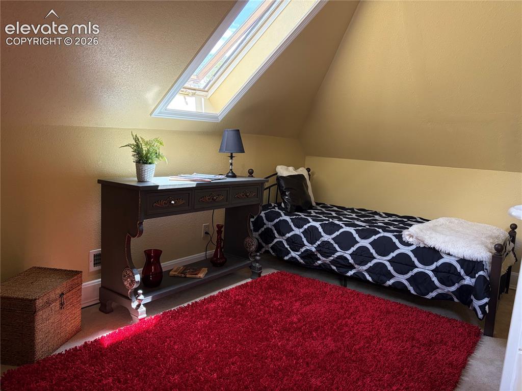 Image 9 of 25: Head upstairs to discover the bonus loft, a bright and flexible additional 