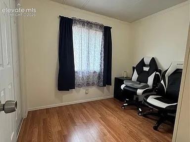 Image 19 of 34: One of three bedrooms