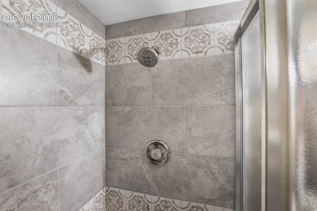 Image 37 of 48: Updated shower 