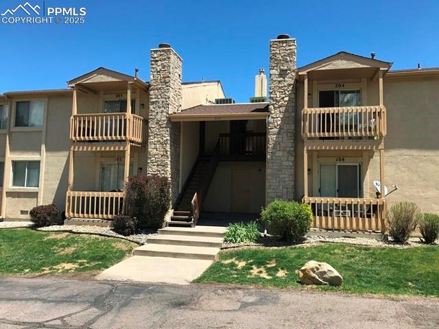 Image 3 of 35: View of building exterior with stairway