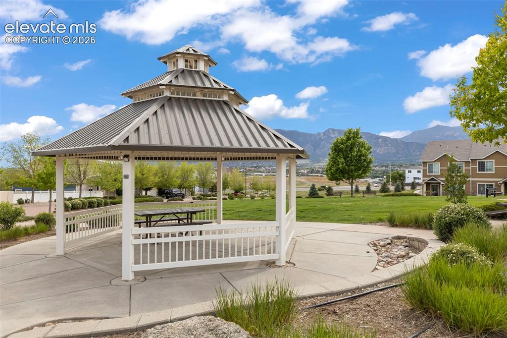 Image 22 of 22: Open-air gazebo with a   patio and picnic area