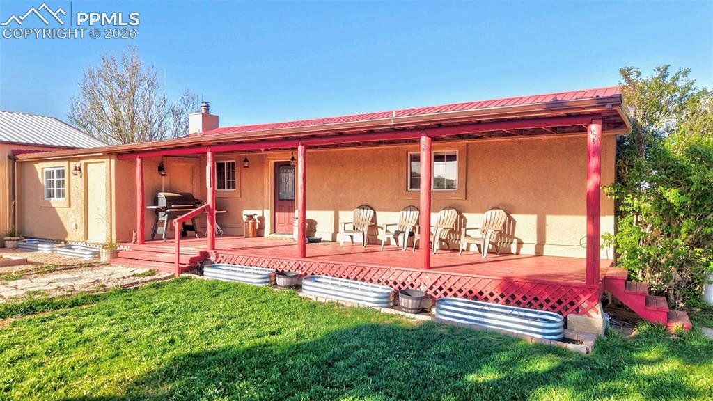 Caption: Welcoming east-facing front entry with covered porch 