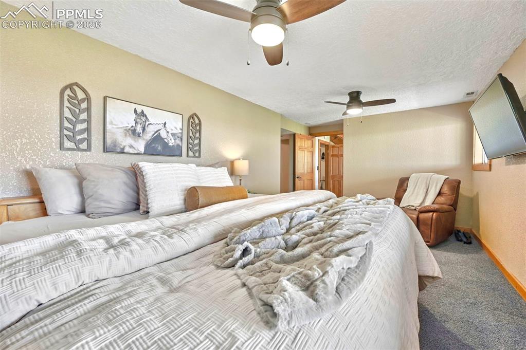 Image 22 of 34: Spacious lower level bedroom