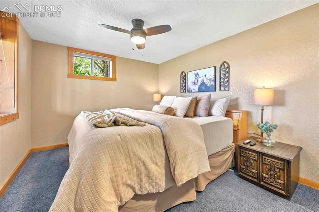 Image 23 of 34: Spacious lower level bedroom