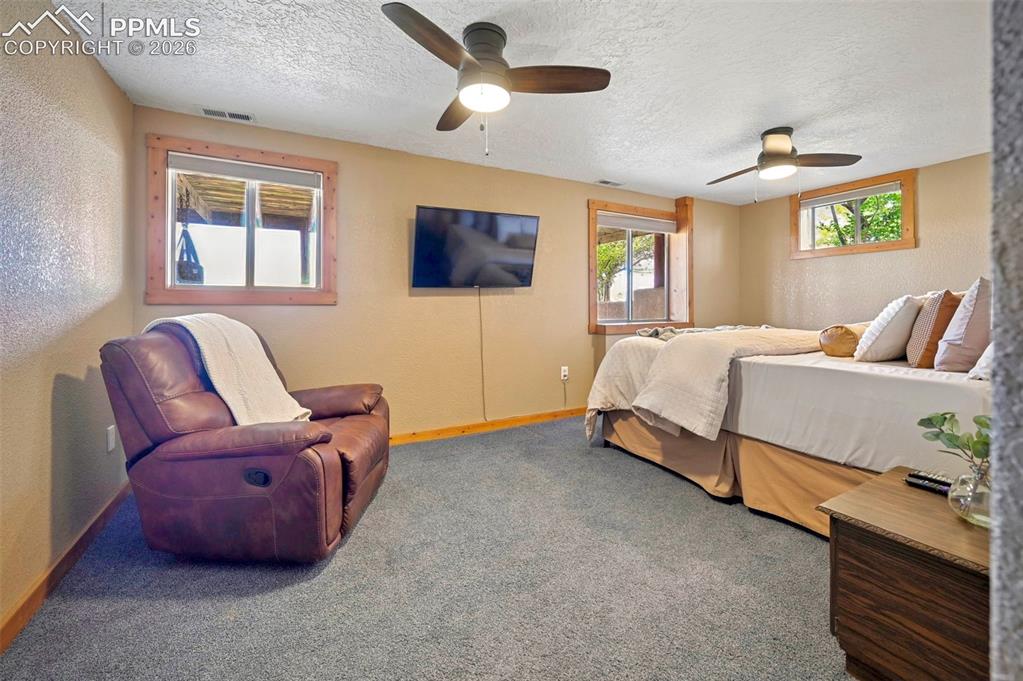 Image 24 of 34: Spacious lower level bedroom