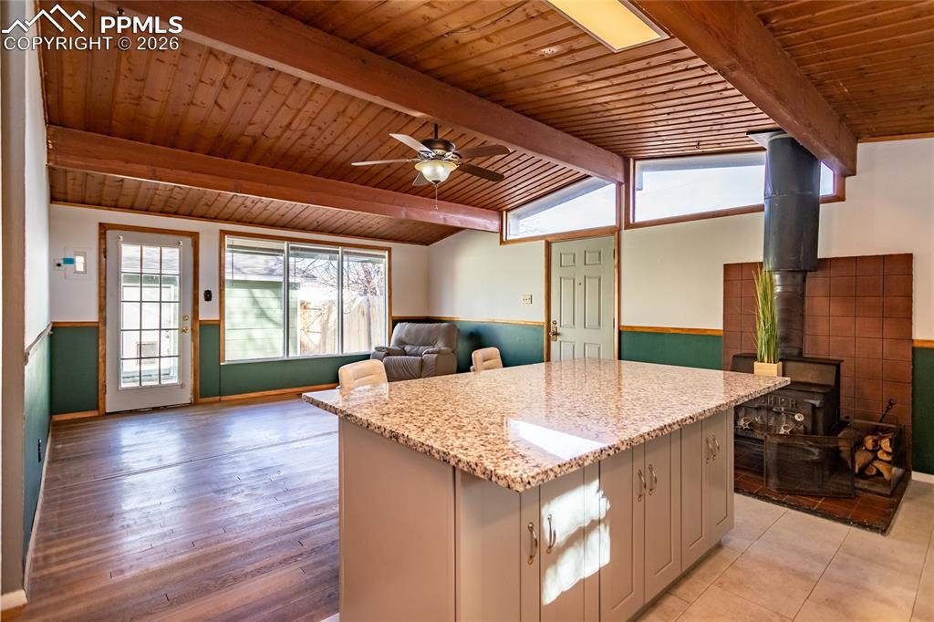 Image 15 of 36: Vaulted ceiling in living room / kitchen for added light.