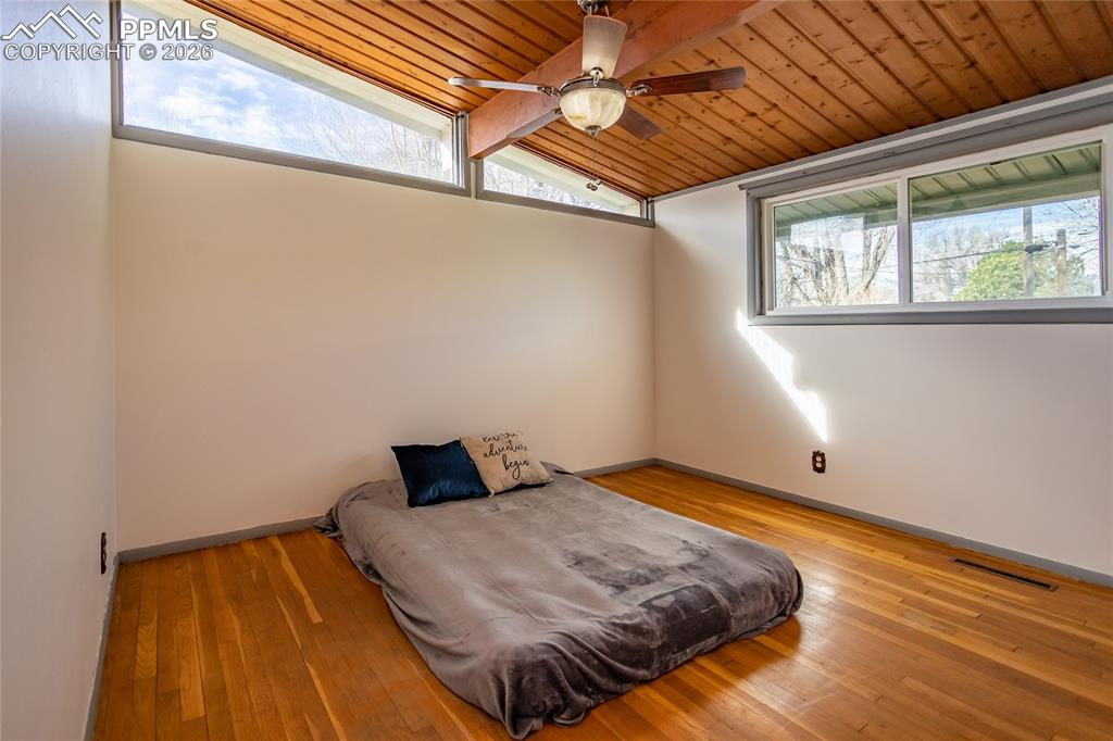 Image 25 of 36: First bedroom.