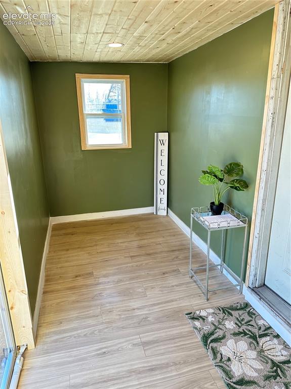 Image 28 of 40: Totally remodeled entryway/enclosed porch