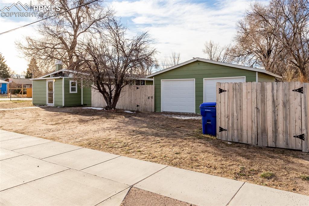 Image 3 of 36: Corner lot with alleyway on the side.
