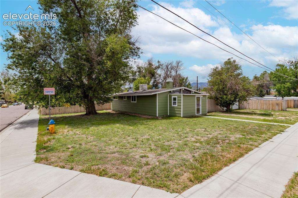Image 30 of 40: Corner Lot with large usable yard.