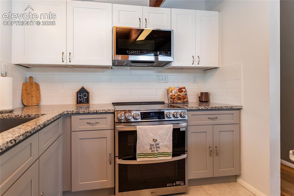 Image 9 of 40: Single basin kitchen sink.