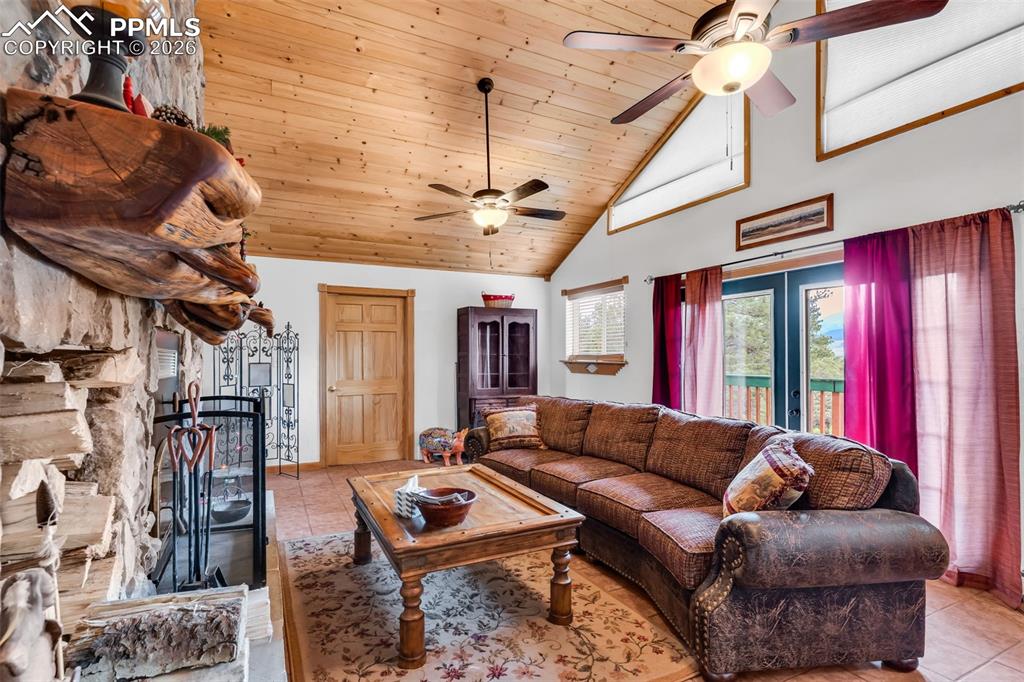 Image 15 of 49: Walkout to back deck from the family room and door to primary bedroom