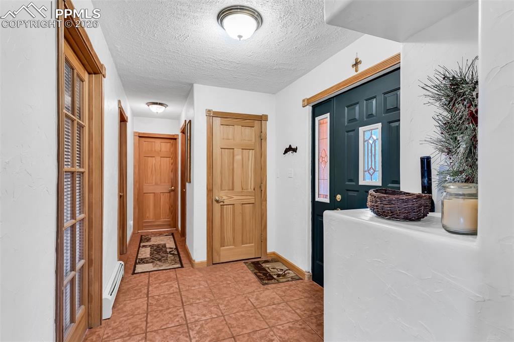 Image 25 of 49: Two additional bedrooms upstairs, full bathroom and office currently set up