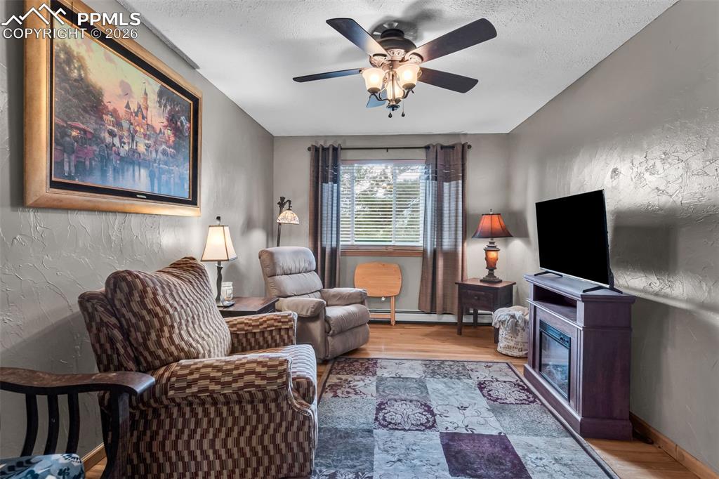 Image 26 of 49: Second living room, office, hobby room, or even non-conforming 6th bedroom