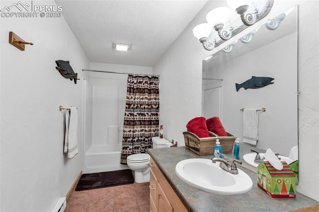 Image 35 of 49: Full bathroom on the lower level