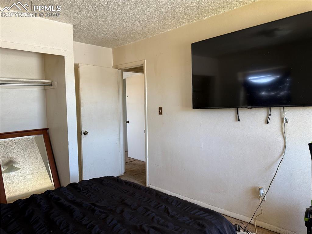 Image 13 of 21: Bedroom