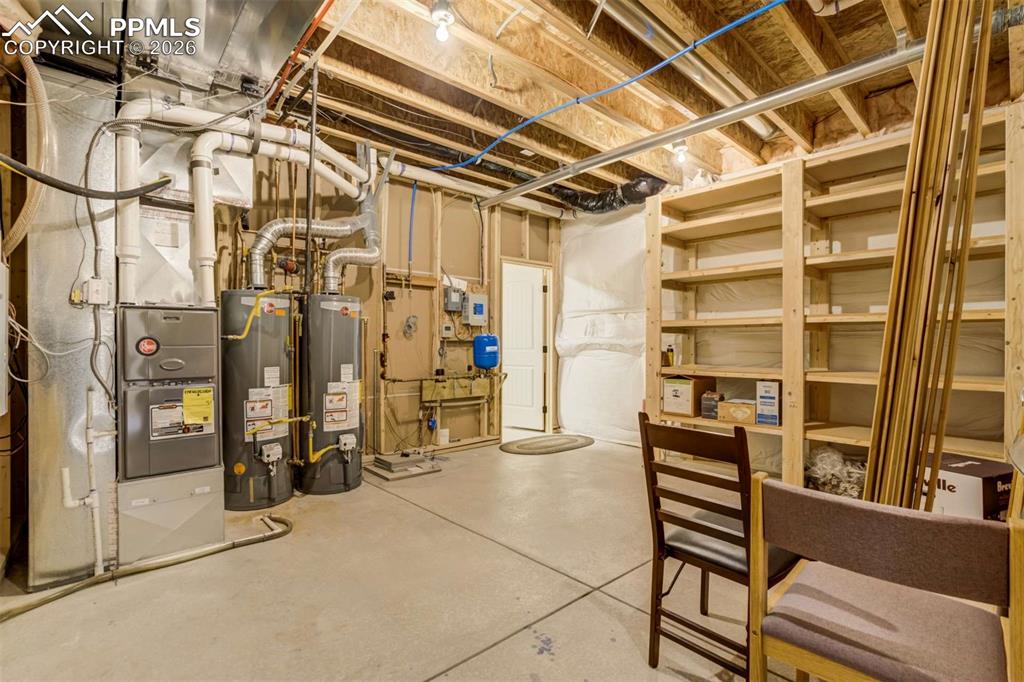 Image 38 of 46: Ample storage space in mech room next to small workshop