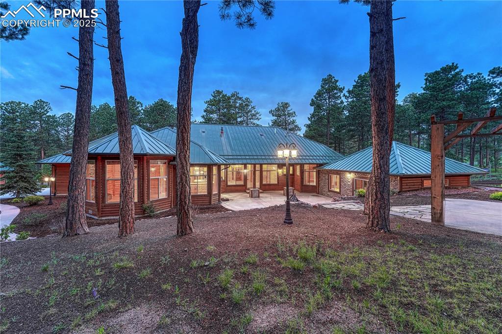 Caption: Stunning true one-level home in the gated High Forest Ranch community
