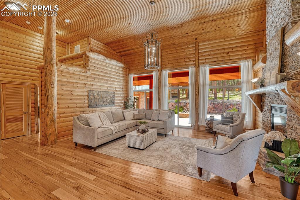 Image 10 of 50: Rustic elegance meets modern lifestyle with panoramic forest views and walk