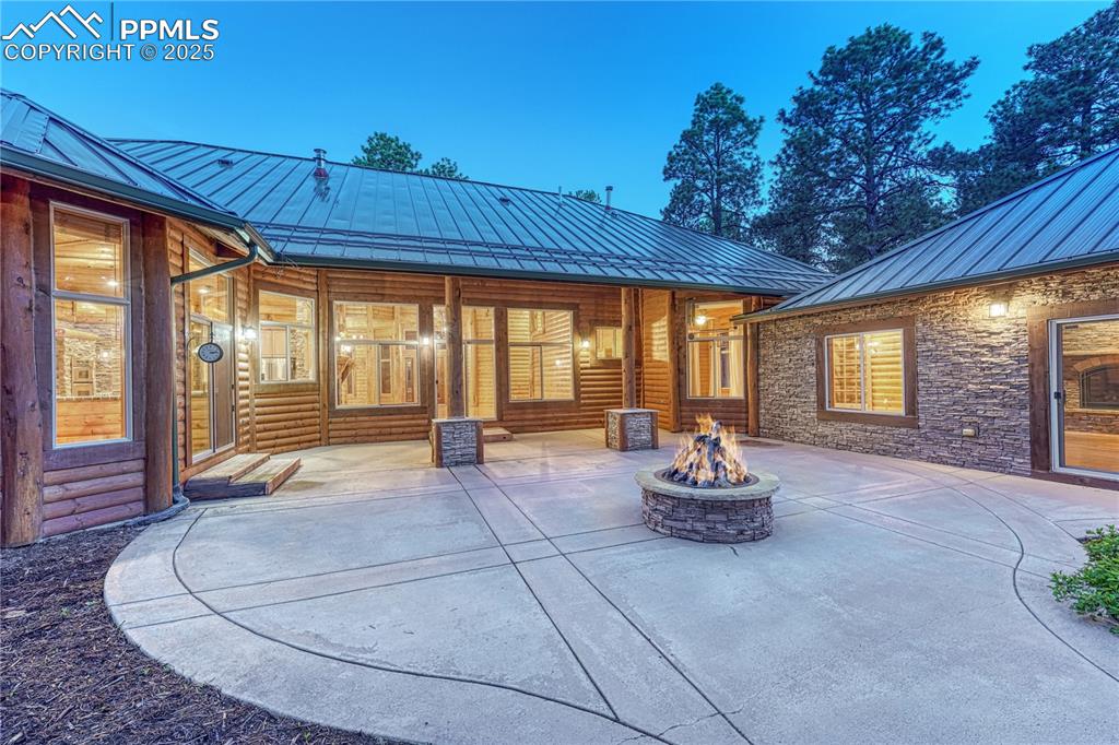 Image 39 of 50: Expansive patio with access from 3 different sliders
