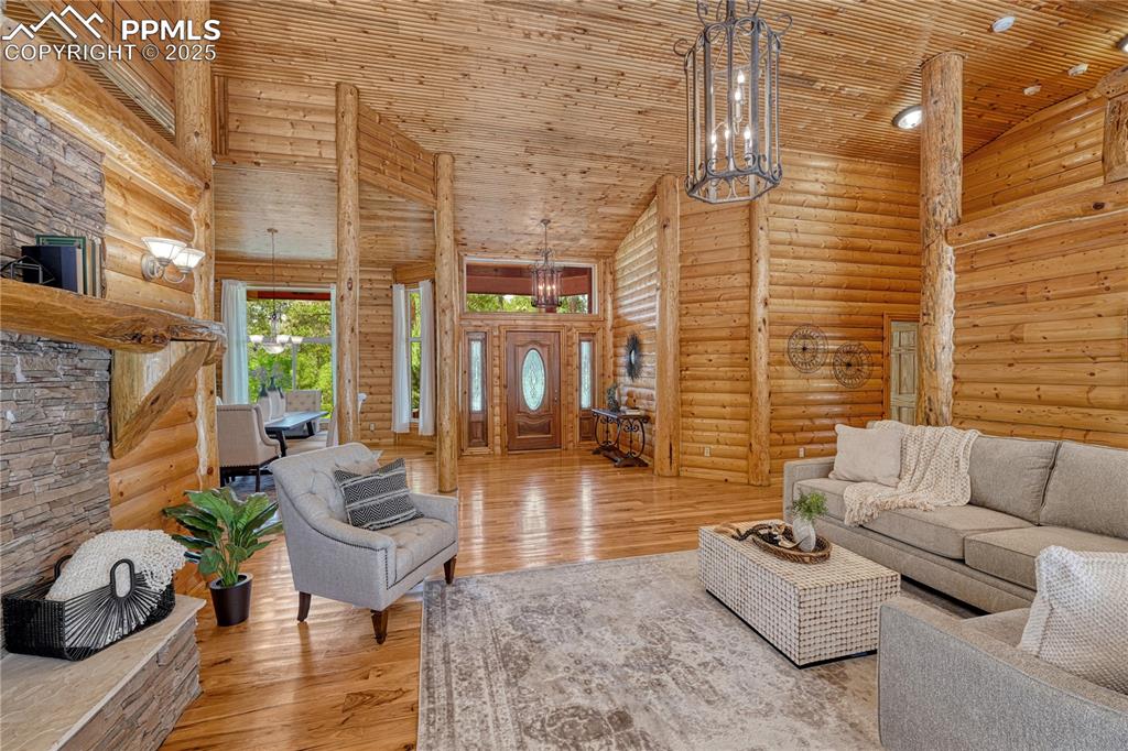 Image 9 of 50: The entry opens up to the expansive living room
