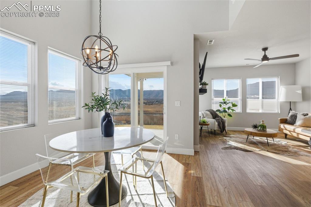 Image 16 of 47: Separate dining room space compliments the spaces