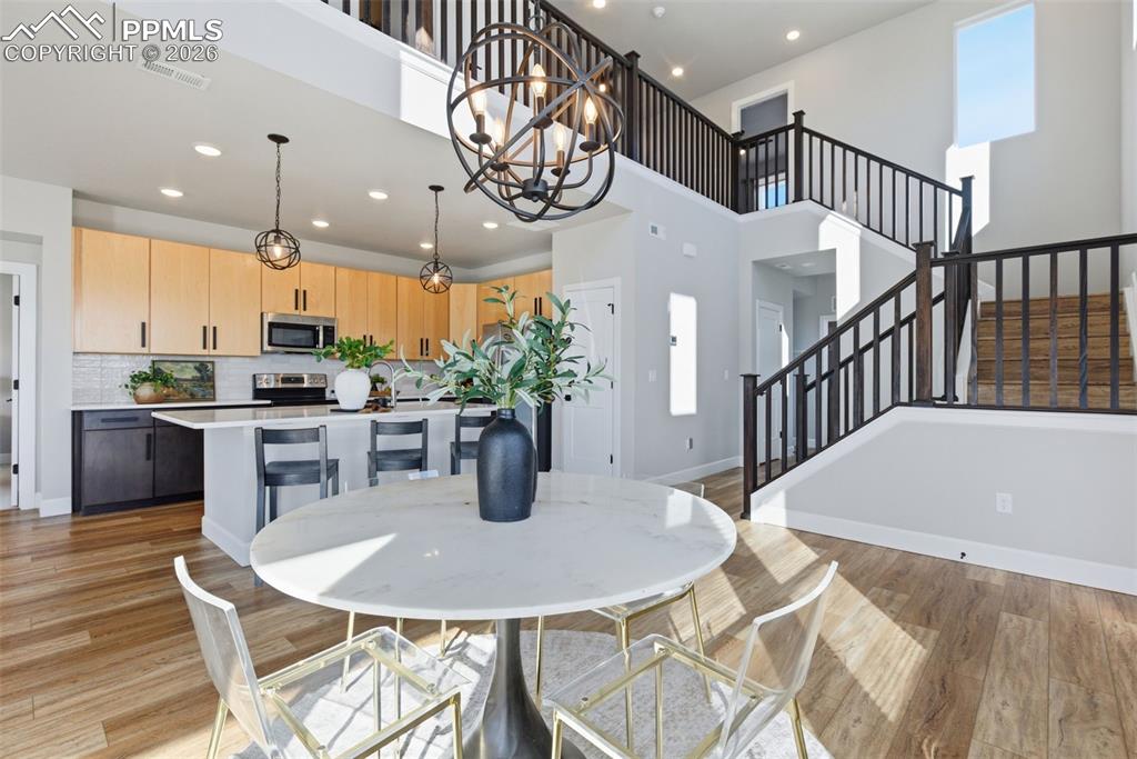 Image 17 of 47: Vaulted ceiling with openness makes this home feel very spacious