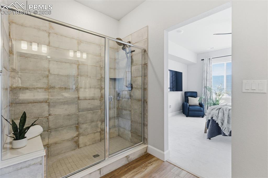 Image 24 of 47: Ensuite bathroom with a luxurious shower