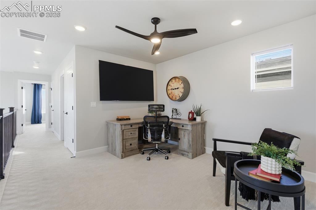 Image 27 of 47: Another view of the flexible loft space with upgraded carpet and pad throug