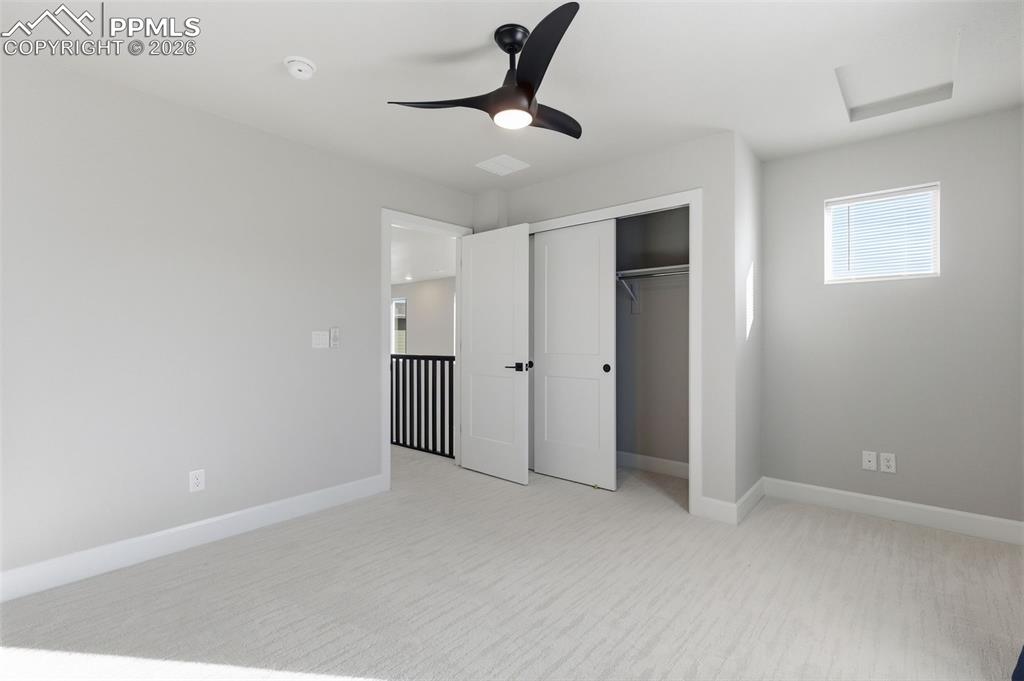 Image 33 of 47: Another view of 3rd bedroom towards hallway