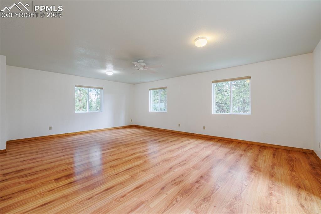 Image 16 of 32: Large upstairs bedroom with plumbing stubbed in for potential bathroom 