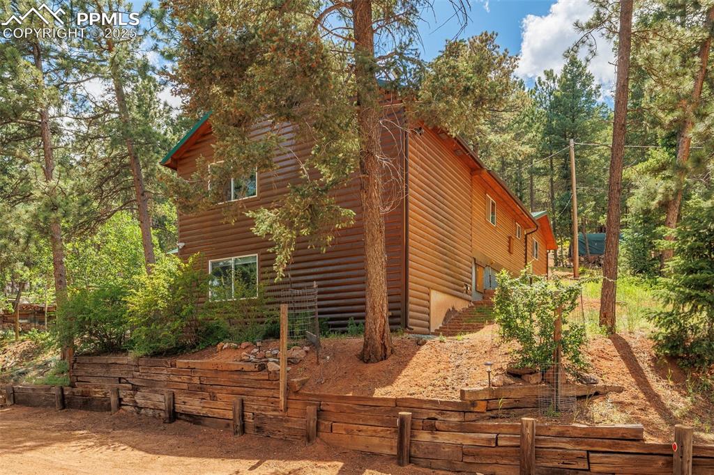 Image 2 of 32: View of side of home