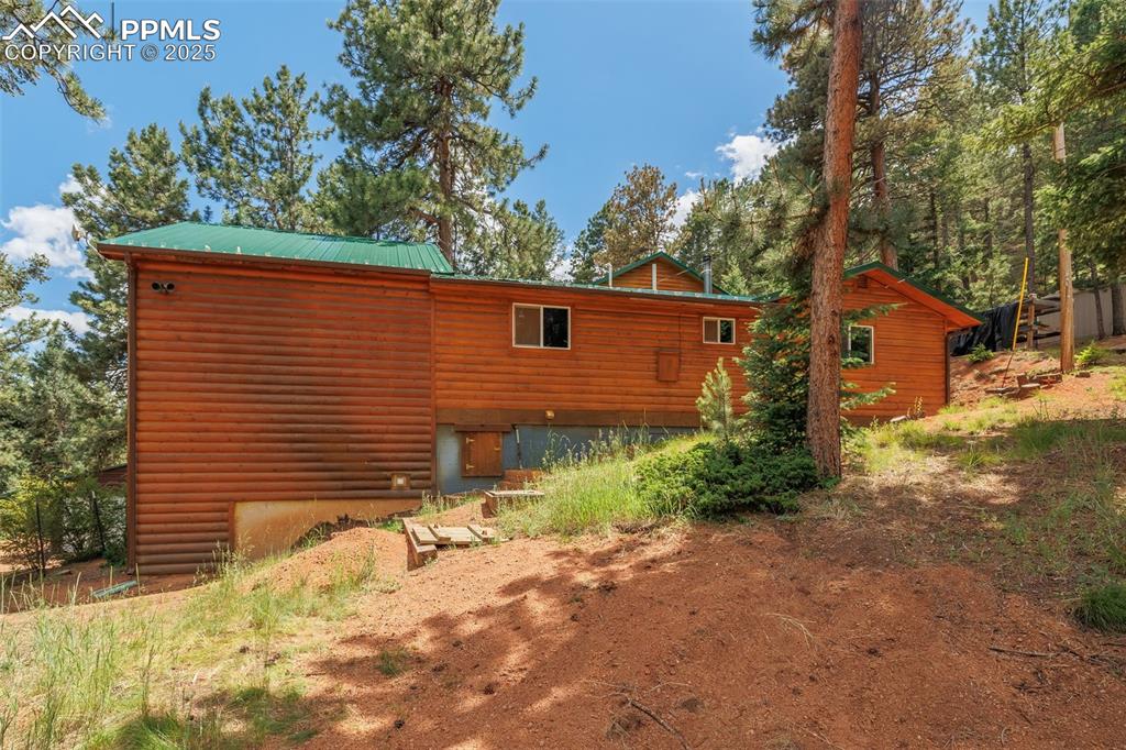 Image 28 of 32: View of side of property 